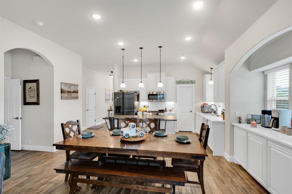 5038 Ridgehurst Lane Midlothian, TX 76065 - Photo 5 of 37 a view of a dining room with furniture