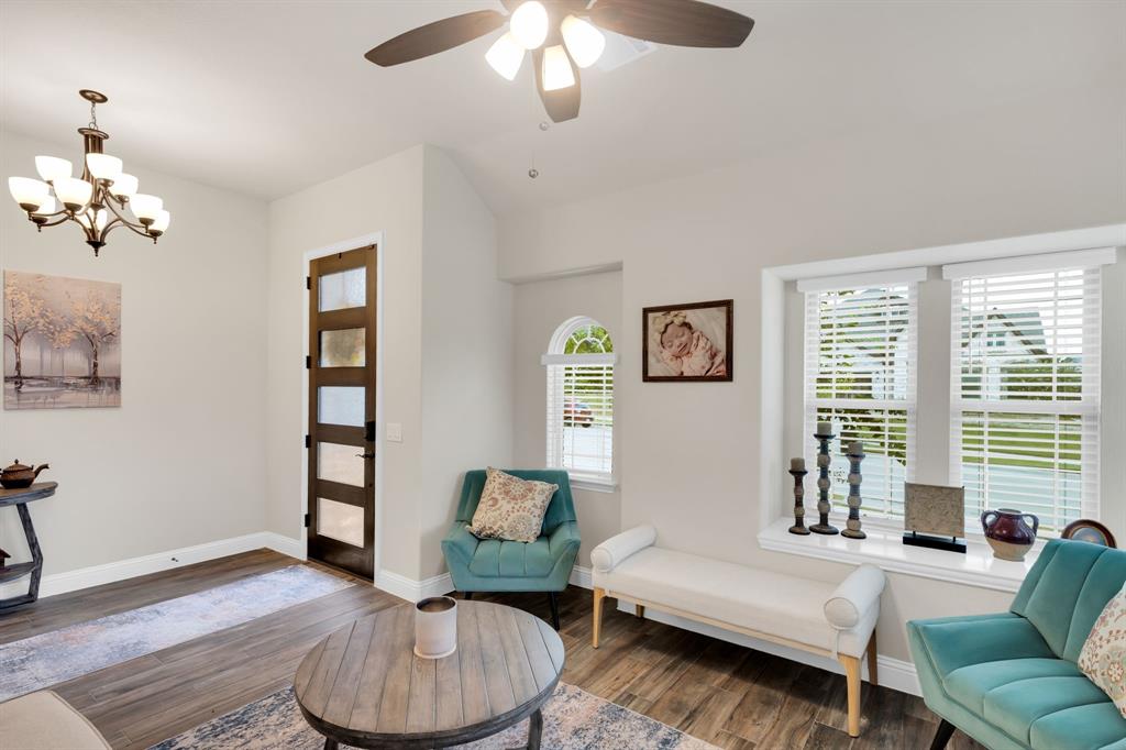 5038 Ridgehurst Lane Midlothian, TX 76065 - Photo 8 of 37 a living room with furniture and a large window