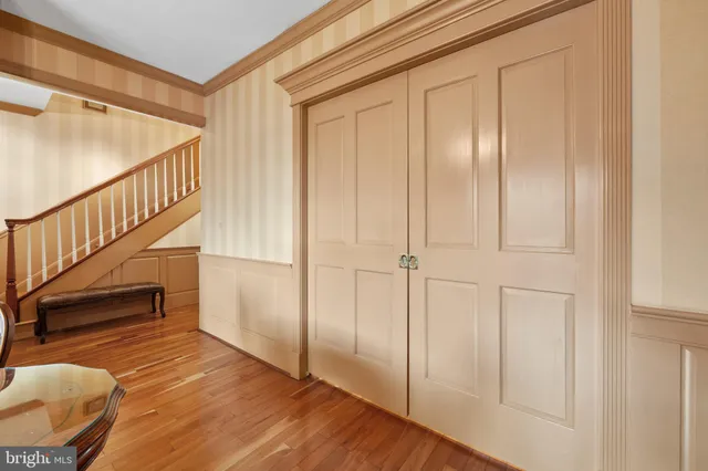 a view of entryway with wooden floor