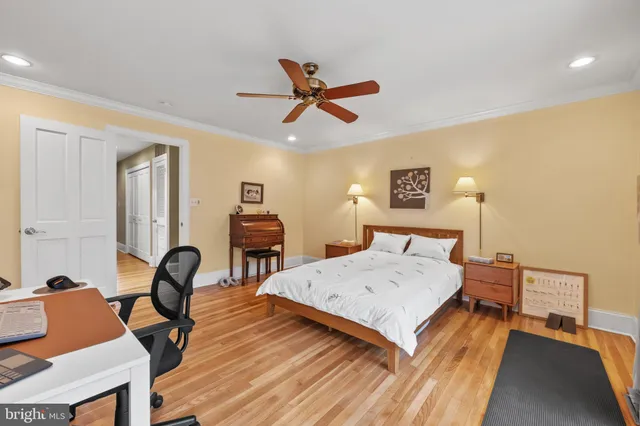 a bed room with a bed and furniture