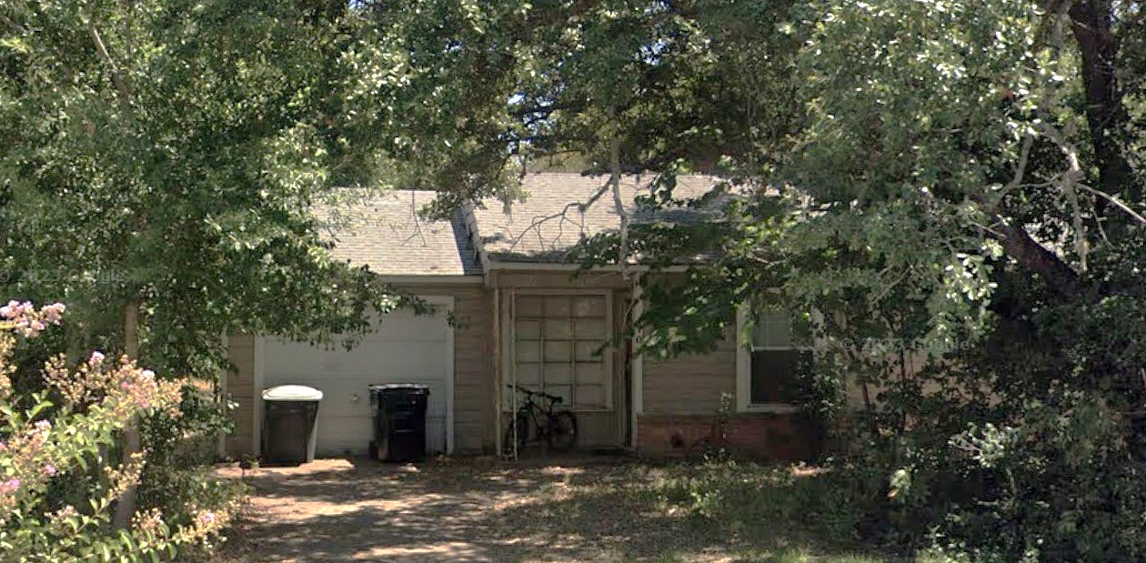 708 Inlow Boulevard College Station, TX 77840 - Photo 1 of 1 a view of a couches and trees with wooden fence