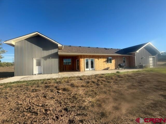 17823 6353 Road Montrose, CO 81403 - Photo 4 of 39 a front view of a house with a yard