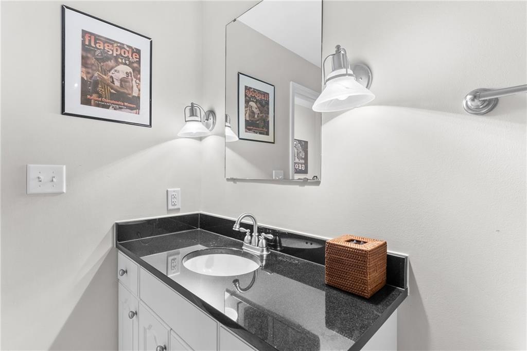 755 West Broad Street, Unit 820 Athens, GA 30601 - Photo 24 of 64 a bathroom with a sink and a mirror