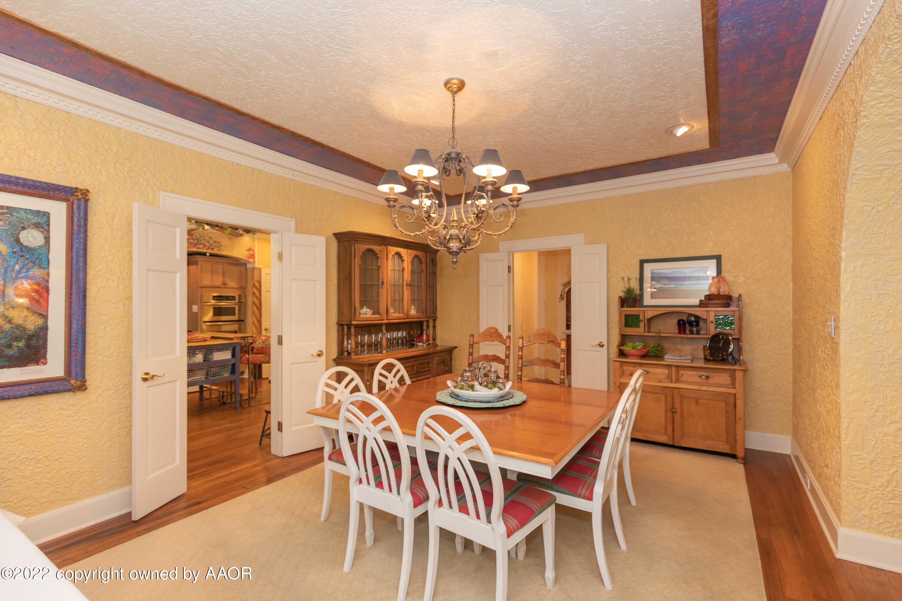 1607 South Harrison Street Amarillo, TX 79102 - Photo 11 of 71 a view of a dining room with furniture and chandelier