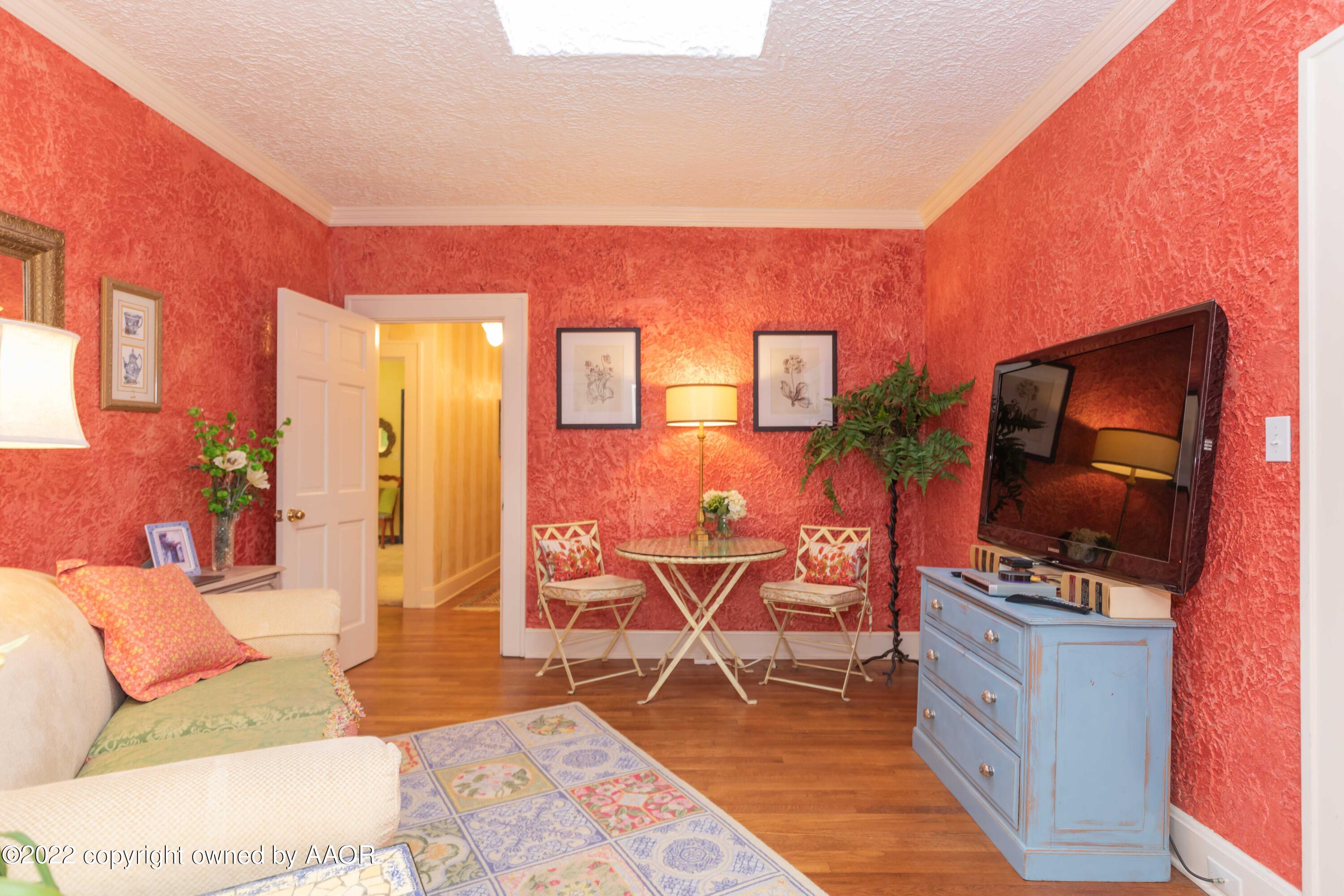 1607 South Harrison Street Amarillo, TX 79102 - Photo 48 of 71 a view of a livingroom with furniture and a flat screen tv