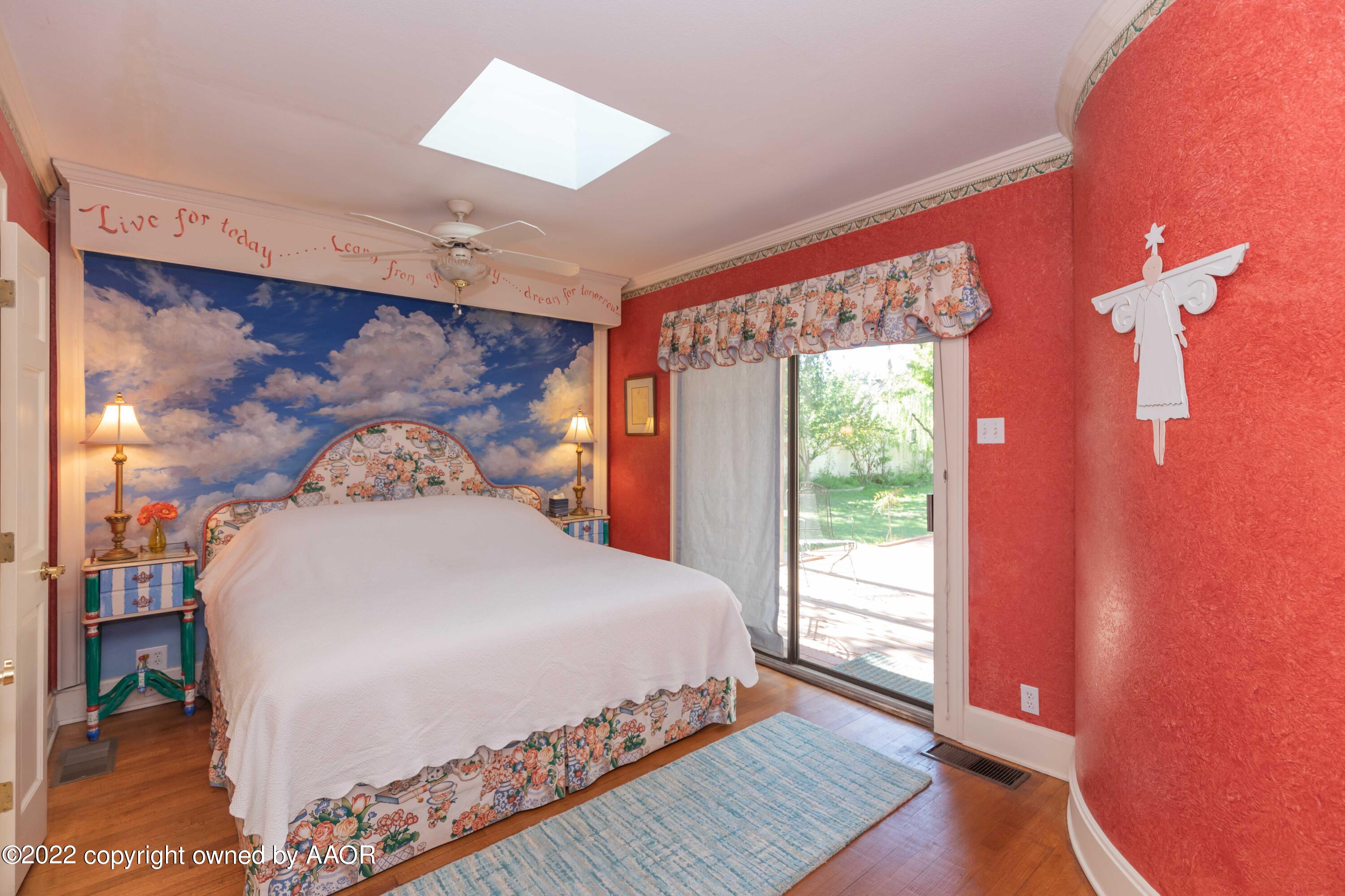 1607 South Harrison Street Amarillo, TX 79102 - Photo 50 of 71 a bedroom with a large bed and a large window