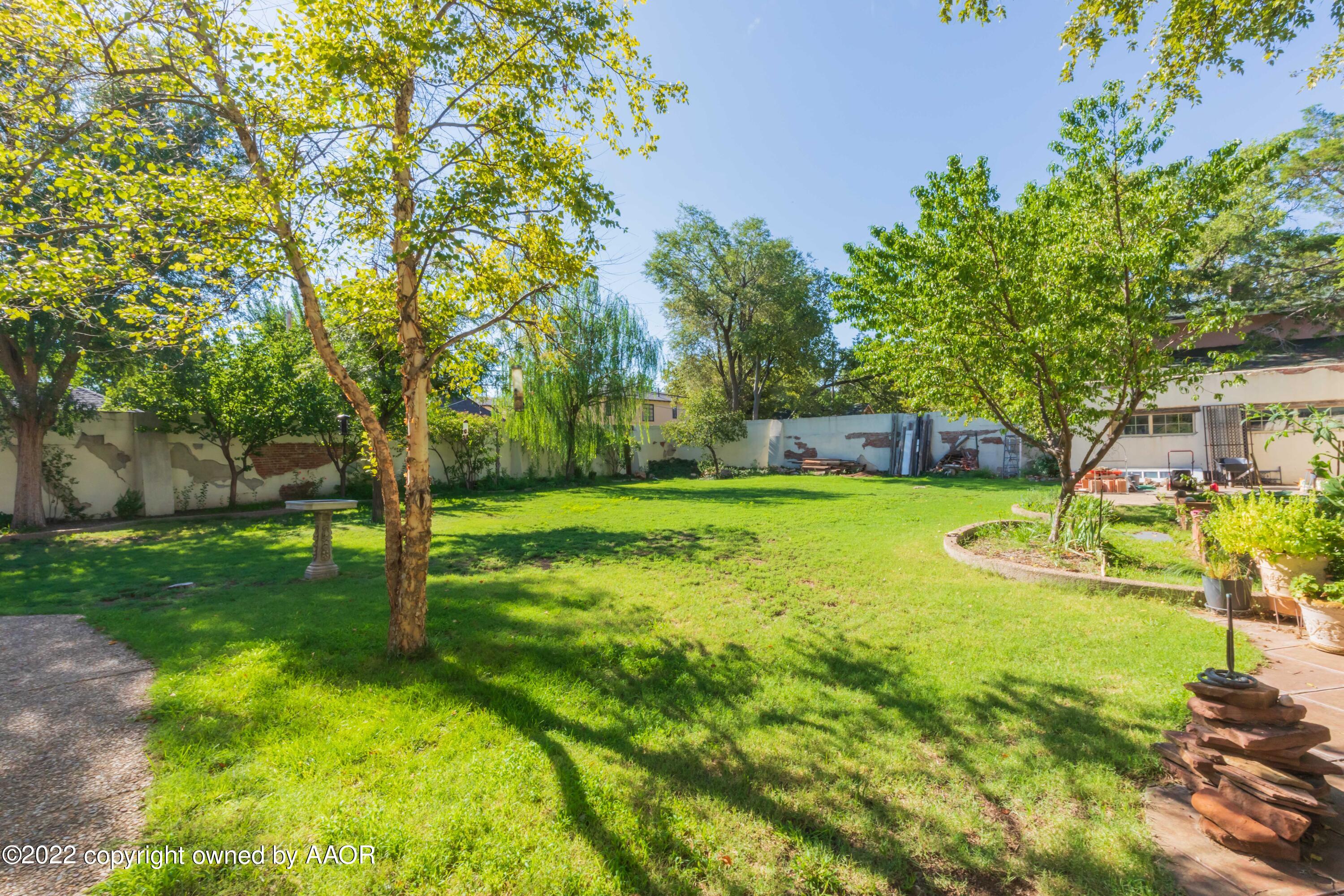 1607 South Harrison Street Amarillo, TX 79102 - Photo 65 of 71 a view of a house with a yard