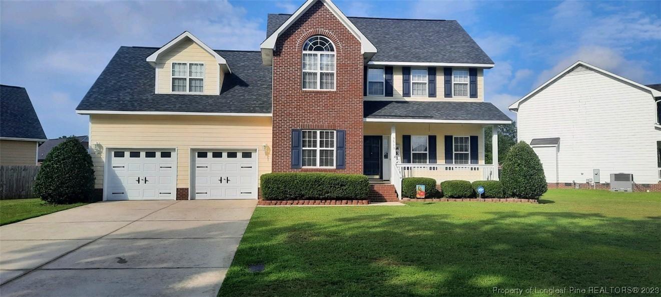 3513 Talus Road Fayetteville, NC 28306 - Photo 1 of 37 a front view of a house with a yard