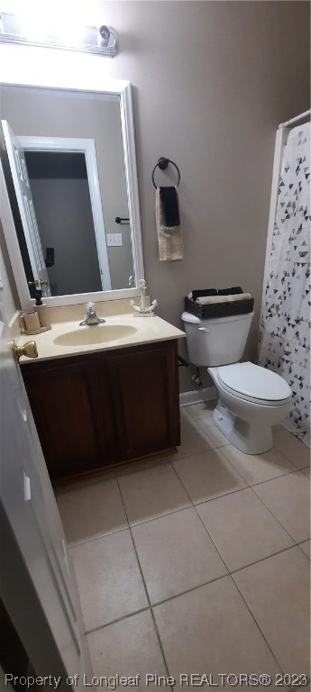 3513 Talus Road Fayetteville, NC 28306 - Photo 27 of 37 a view of bathroom with a toilet sink and mirror