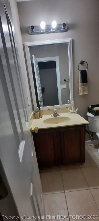 3513 Talus Road Fayetteville, NC 28306 - Photo 28 of 37 a bathroom with a sink vanity and mirror