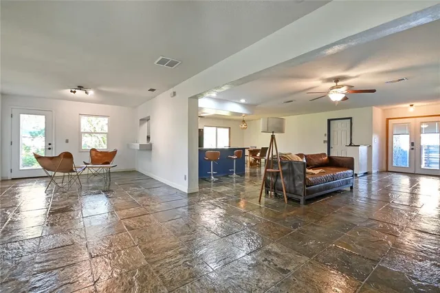 a living room with furniture and a table