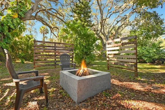 a view of a fountain in the backyard