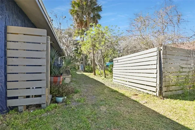 a view of a back yard of the house
