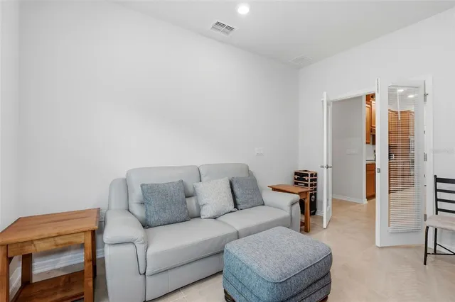 a living room with furniture and a couch