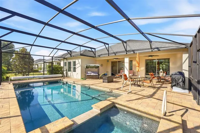 a view of a patio with swimming pool
