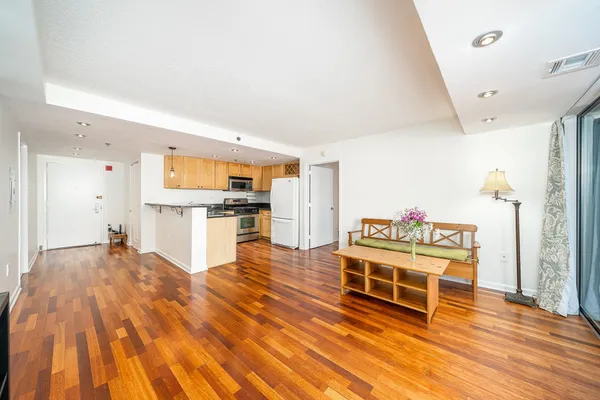 a view of livingroom with wooden floor