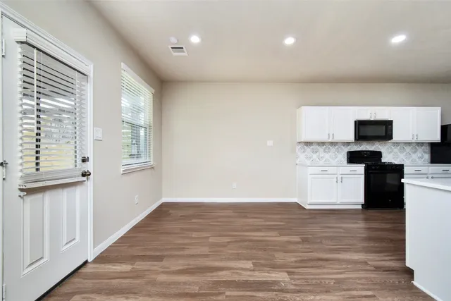 a bathroom with a sink a mirror and a shower