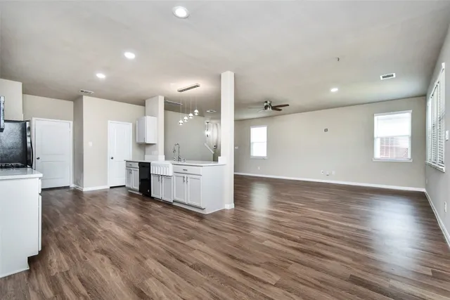a view of entryway with wooden floor