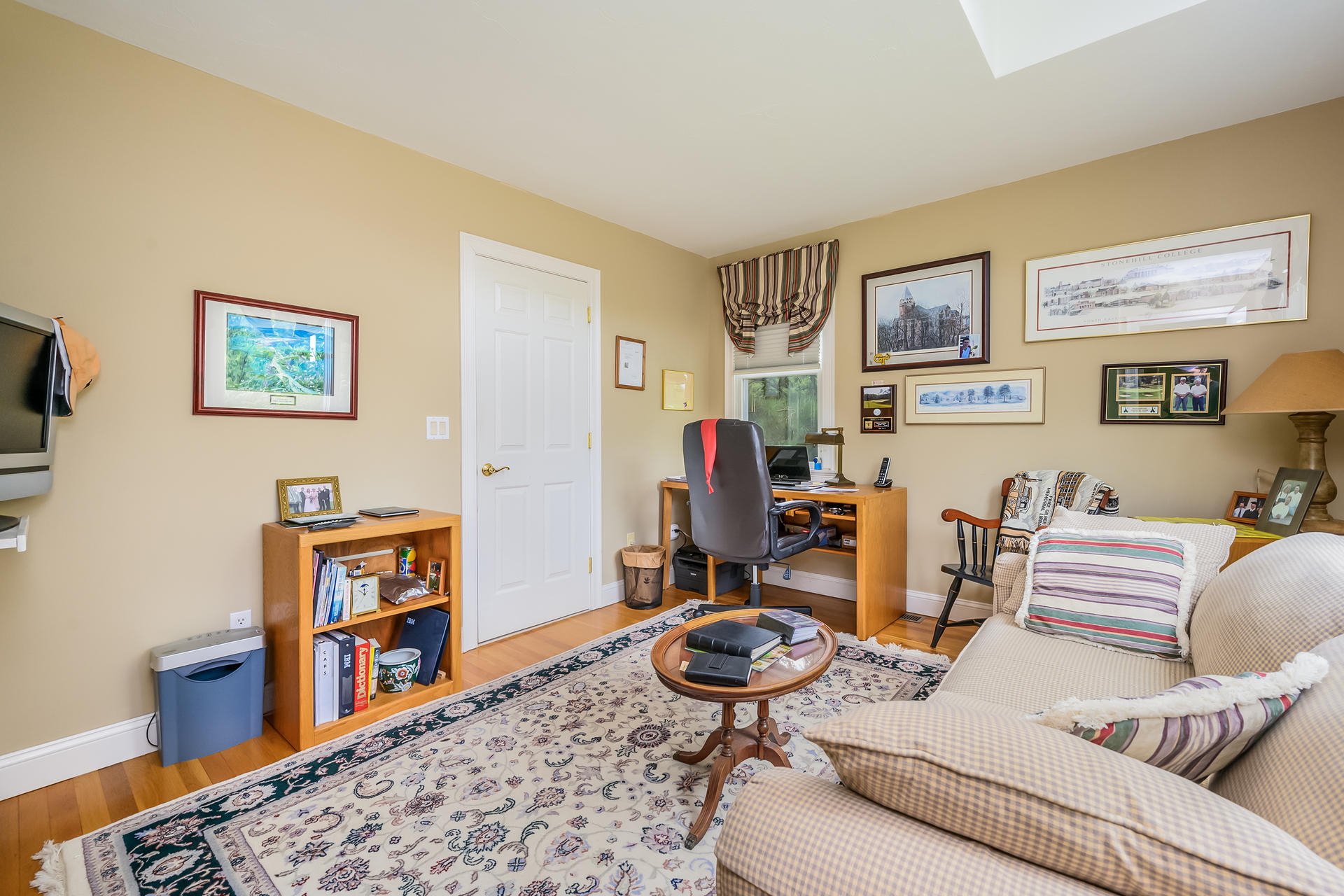 112 Cairn Ridge Road East Falmouth, MA 02536 - Photo 11 of 31 a living room with furniture and painting on the wall