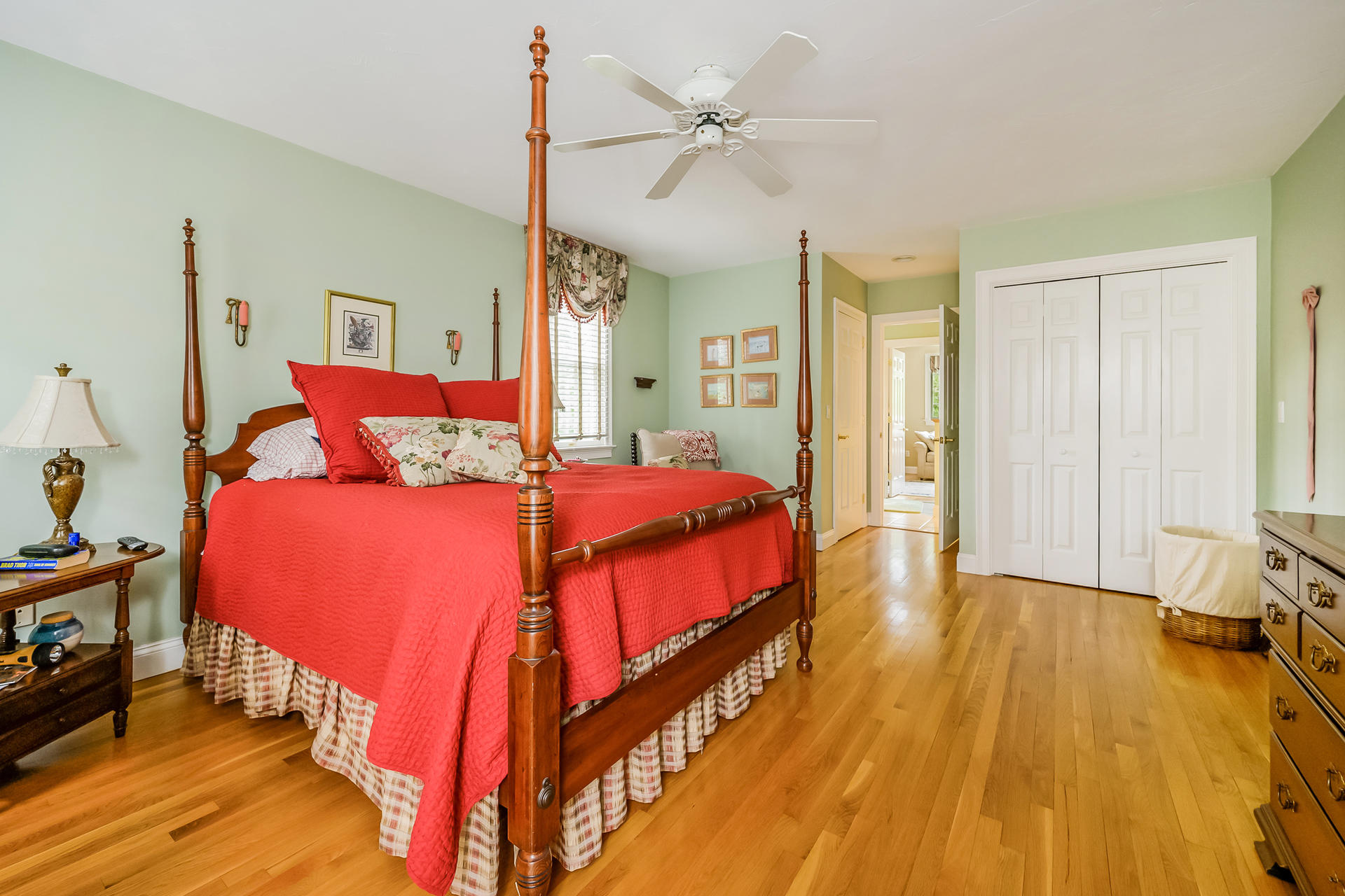 112 Cairn Ridge Road East Falmouth, MA 02536 - Photo 13 of 31 a bedroom with a bed and wooden floor
