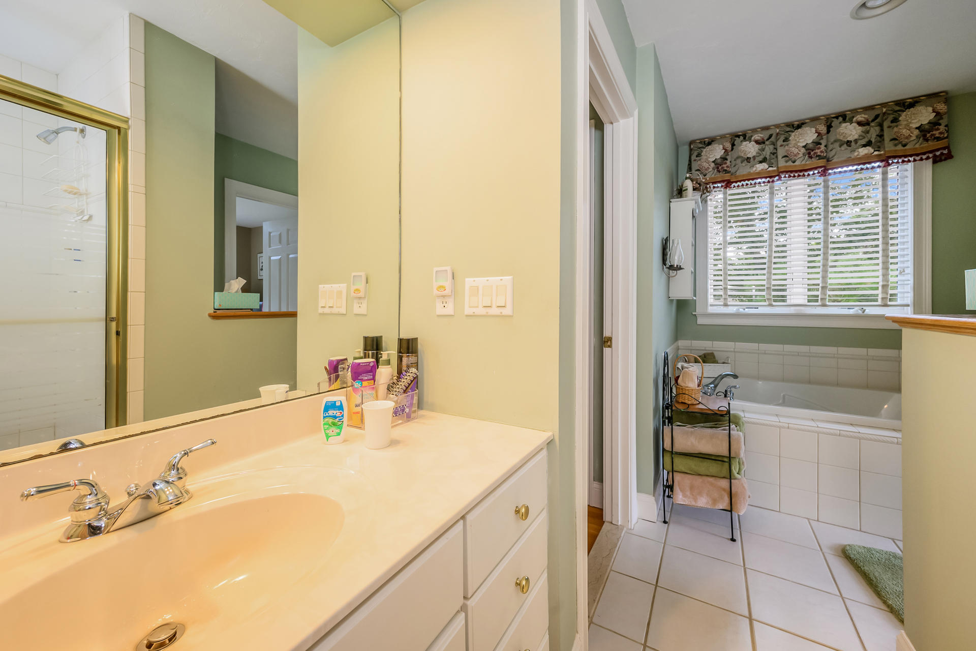 112 Cairn Ridge Road East Falmouth, MA 02536 - Photo 14 of 31 a en suite bathroom with a granite countertop sink and a mirror