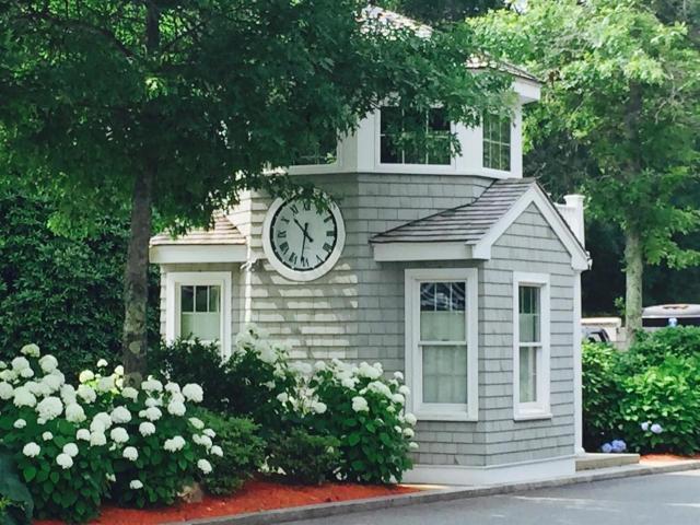 112 Cairn Ridge Road East Falmouth, MA 02536 - Photo 26 of 31 a front view of a house with garden