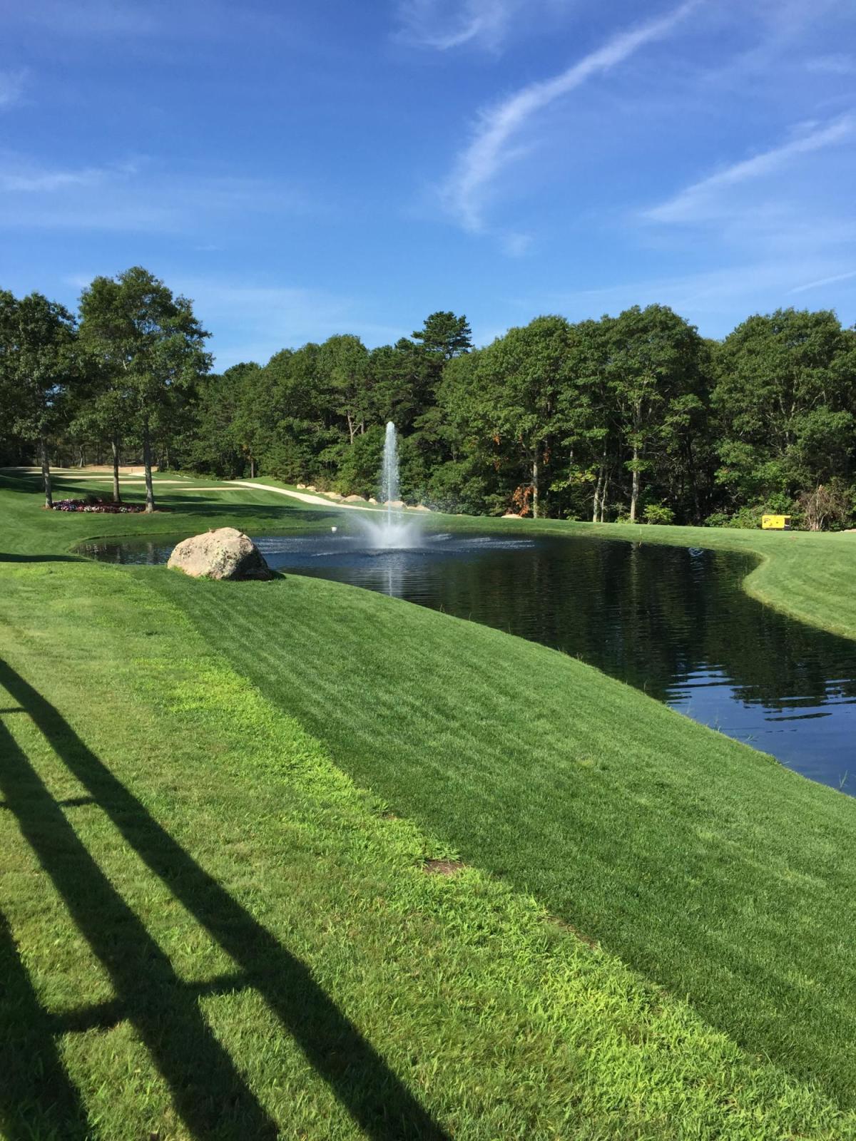 112 Cairn Ridge Road East Falmouth, MA 02536 - Photo 27 of 31 a view of a lake with a yard