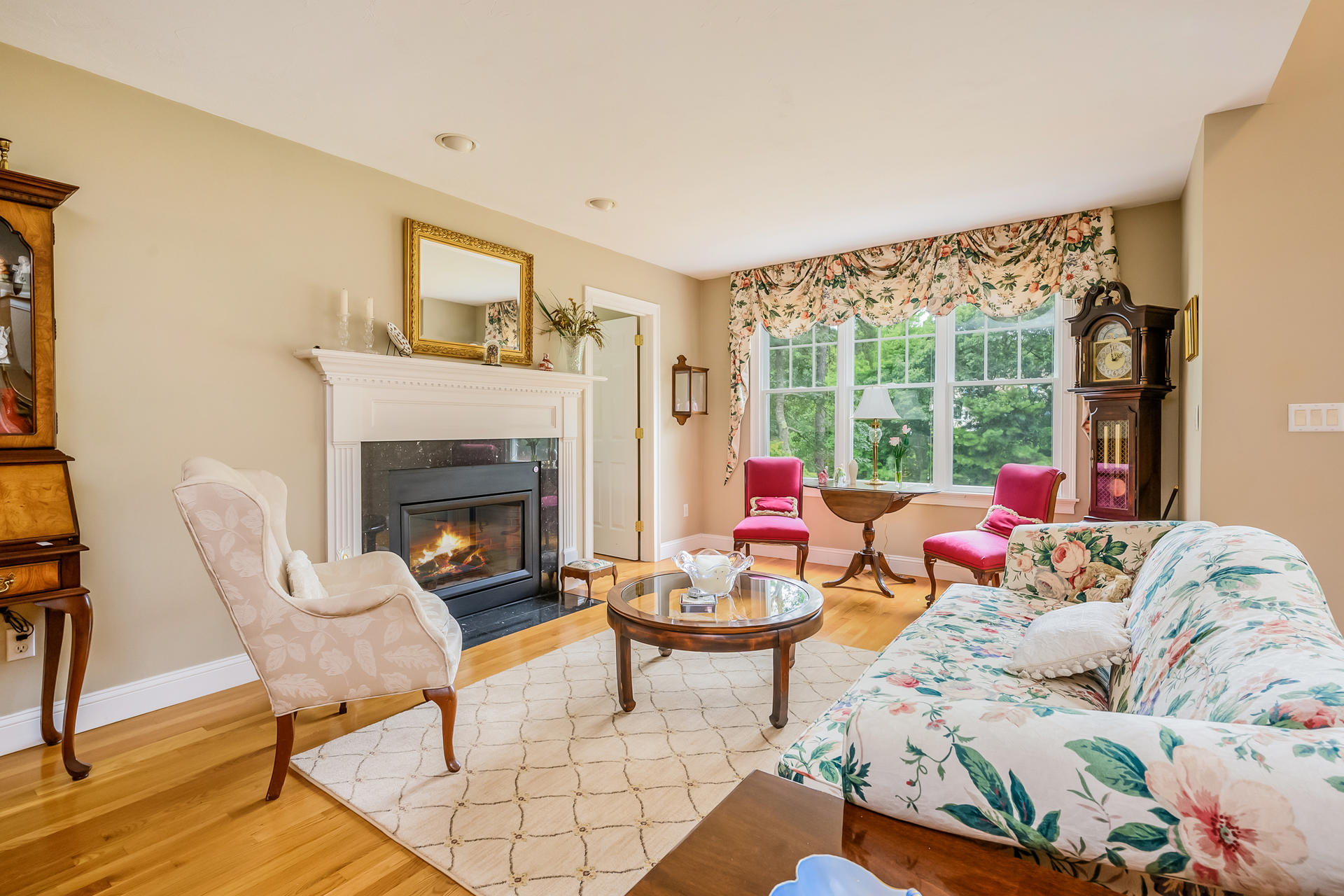 112 Cairn Ridge Road East Falmouth, MA 02536 - Photo 3 of 31 a living room with furniture and a fireplace