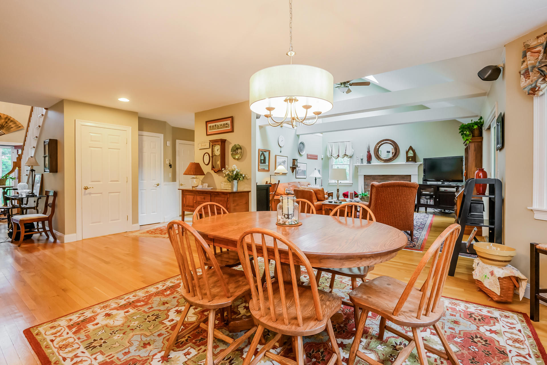 112 Cairn Ridge Road East Falmouth, MA 02536 - Photo 7 of 31 a dining room with furniture and wooden floor