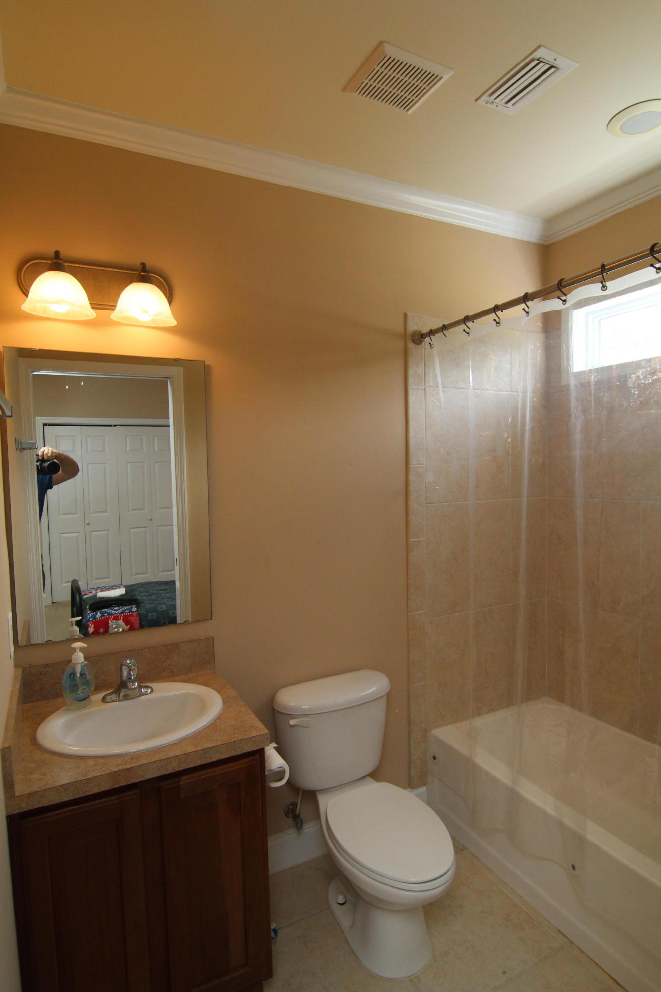 161 6th Street Santa Rosa Beach, FL 32459 - Photo 6 of 13 a bathroom with a sink a toilet and shower