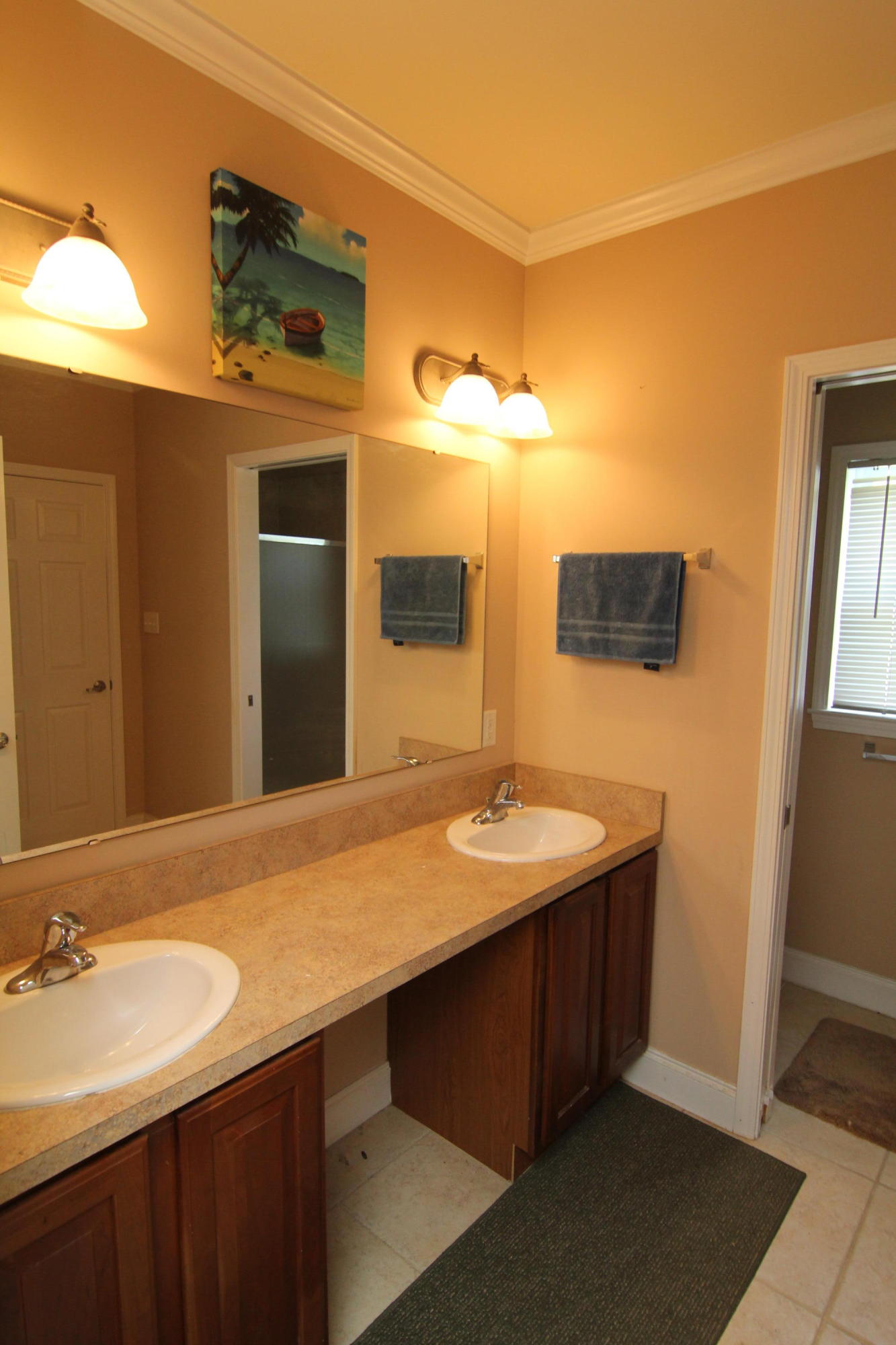 161 6th Street Santa Rosa Beach, FL 32459 - Photo 7 of 13 a bathroom with a granite countertop sink and a mirror