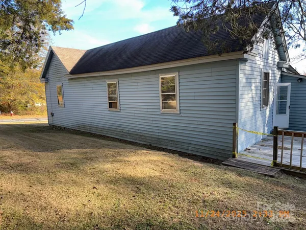 a view of a backyard of a house
