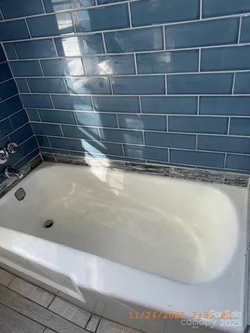 a bathroom with a bathtub