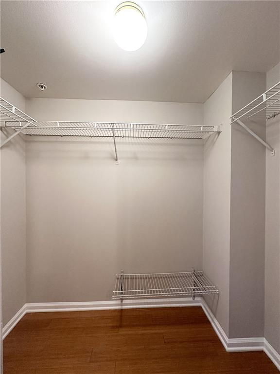 199 14th Street Northeast, Unit 1609 Atlanta, GA 30309 - Photo 18 of 22 a view of a room with racks on the wall