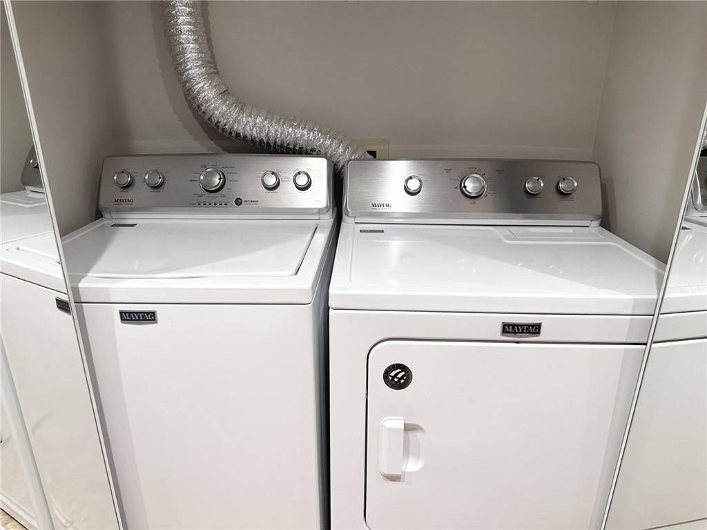 199 14th Street Northeast, Unit 1609 Atlanta, GA 30309 - Photo 22 of 22 a close up view of washer and dryer
