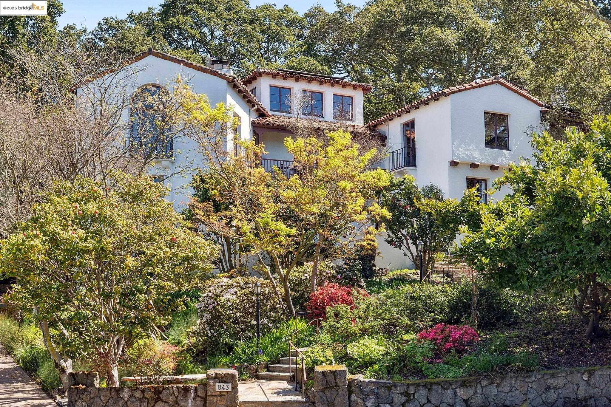 843 Arlington Avenue Berkeley, CA 94707 - Photo 1 of 1 a front view of a house with a yard and fountain