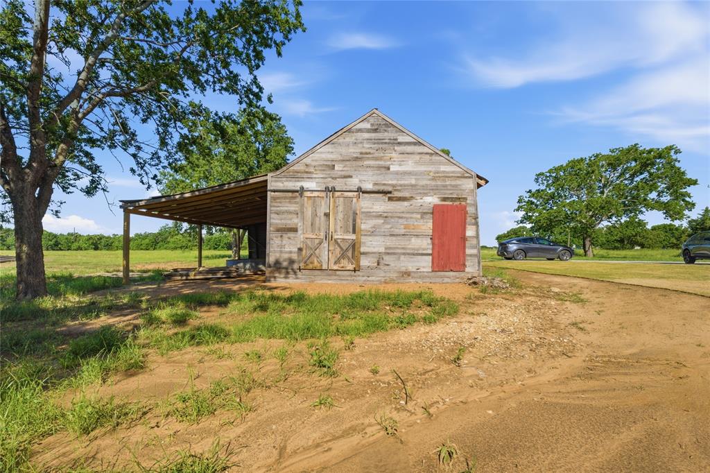 958 Cedar Mills Road Gordonville, TX 76245 - Photo 35 of 40 a front view of a house with a yard