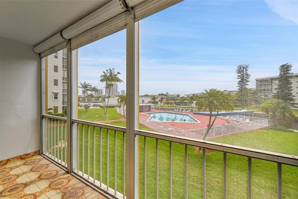 a view of a balcony with city view