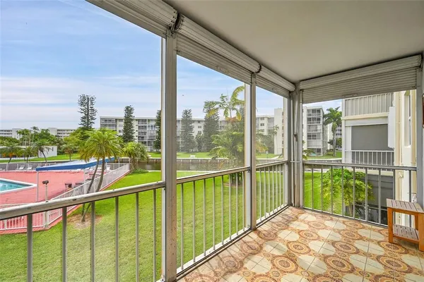a view of a balcony with lake view