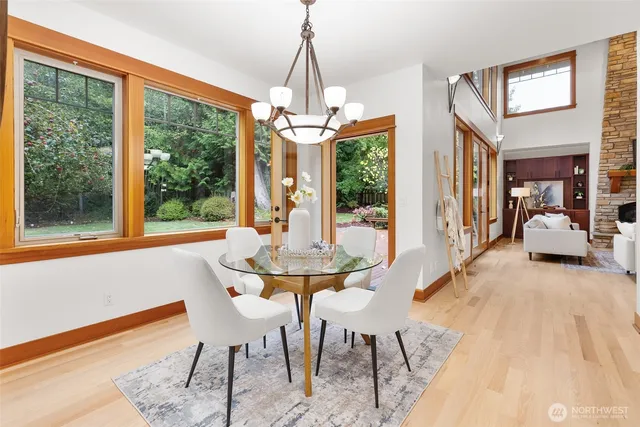 a view of a dining room with furniture window and outside view