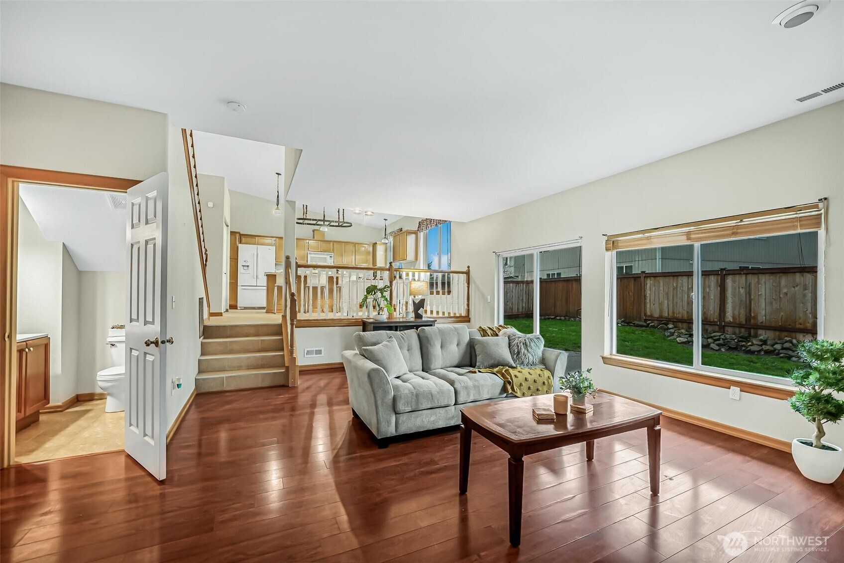 21012 Springhaven Way East Bonney Lake, WA 98391 - Photo 19 of 39 a living room with furniture and a large window
