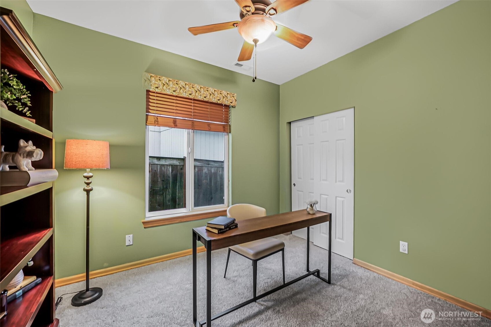21012 Springhaven Way East Bonney Lake, WA 98391 - Photo 21 of 39 a room with furniture and a window