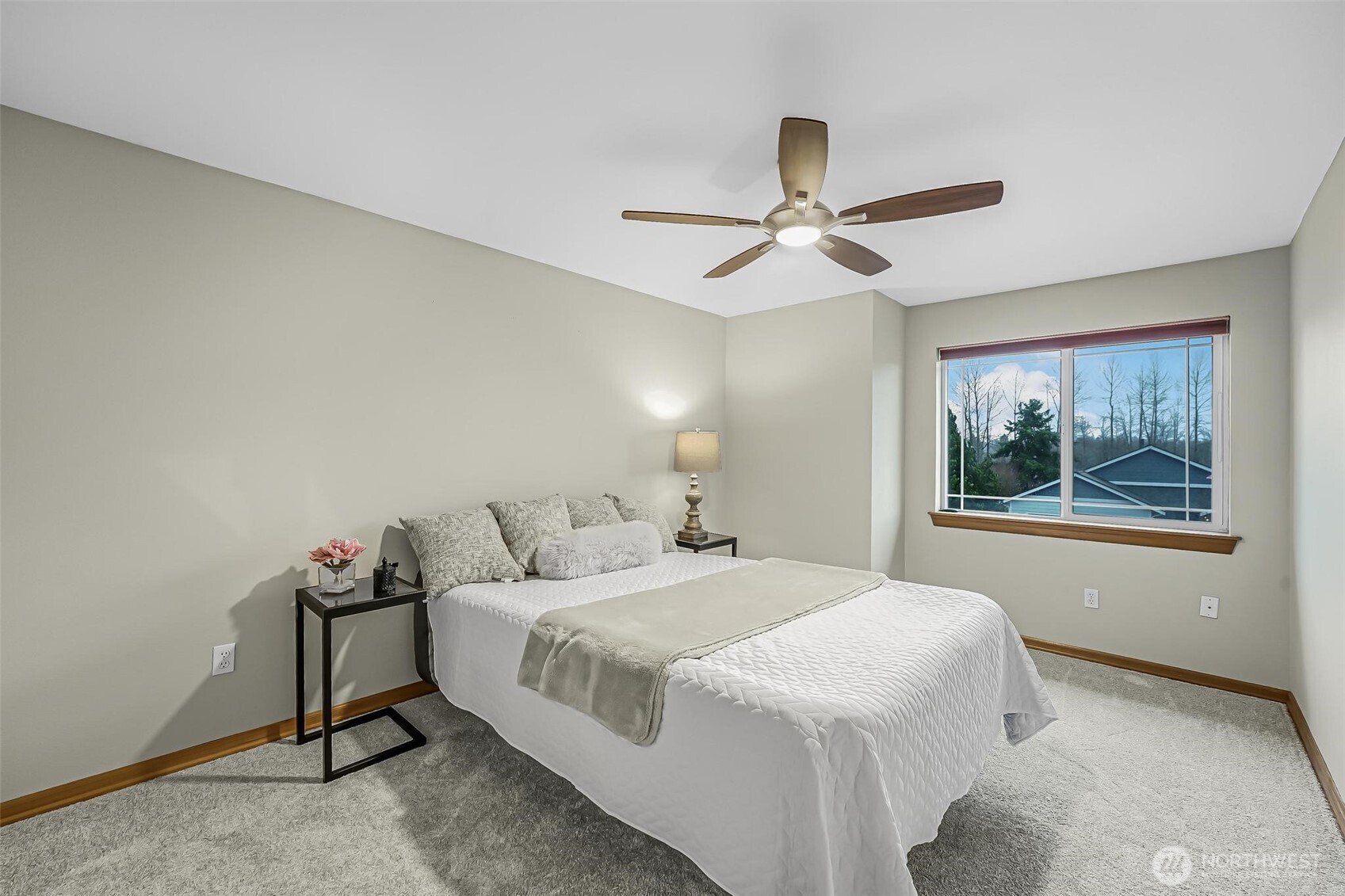 21012 Springhaven Way East Bonney Lake, WA 98391 - Photo 28 of 39 a bedroom with a bed and a window