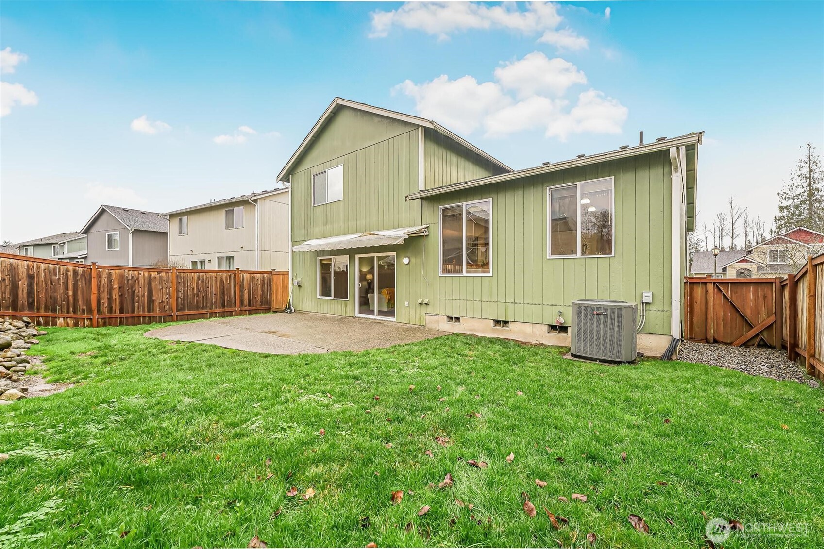 21012 Springhaven Way East Bonney Lake, WA 98391 - Photo 35 of 39 a view of a house with a yard and sitting area