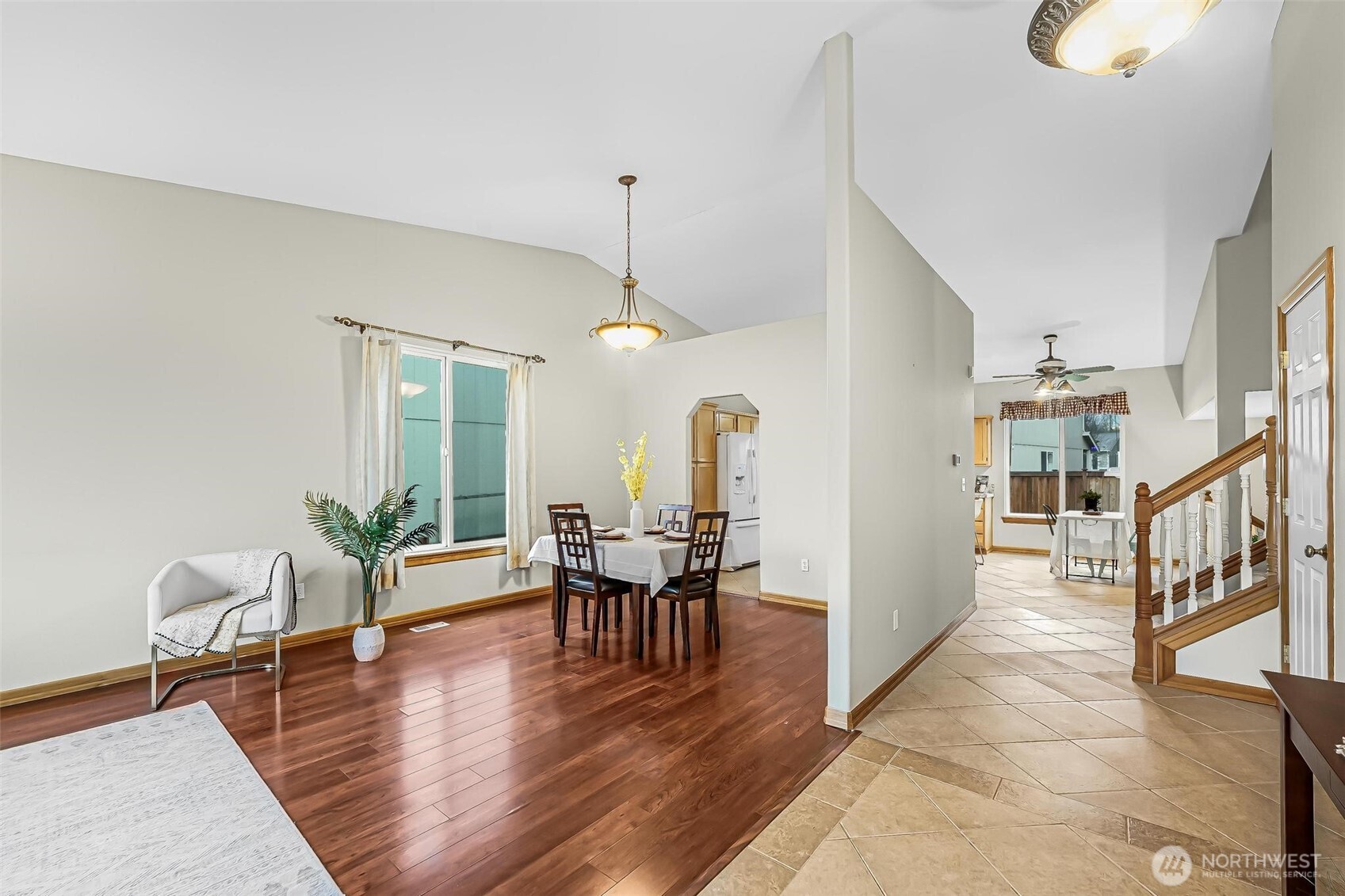 21012 Springhaven Way East Bonney Lake, WA 98391 - Photo 6 of 39 a view of a dining room with furniture window and wooden floor