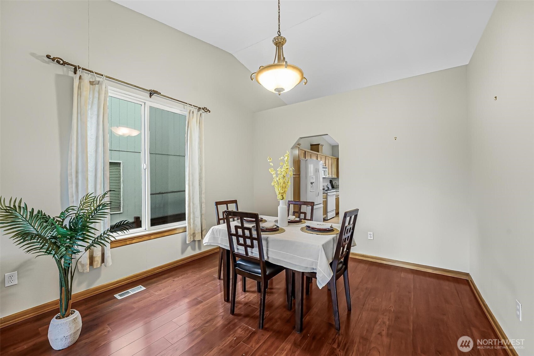 21012 Springhaven Way East Bonney Lake, WA 98391 - Photo 8 of 39 a view of a dining room with furniture and wooden floor