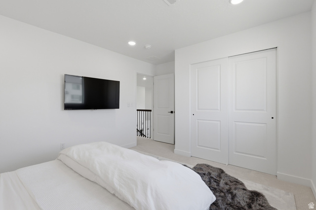 3364 Mapleton Hts Drive, Unit 101 Mapleton, UT 84664 - Photo 30 of 37 Bedroom featuring white walls, recessed lighting, and light-toned carpeting