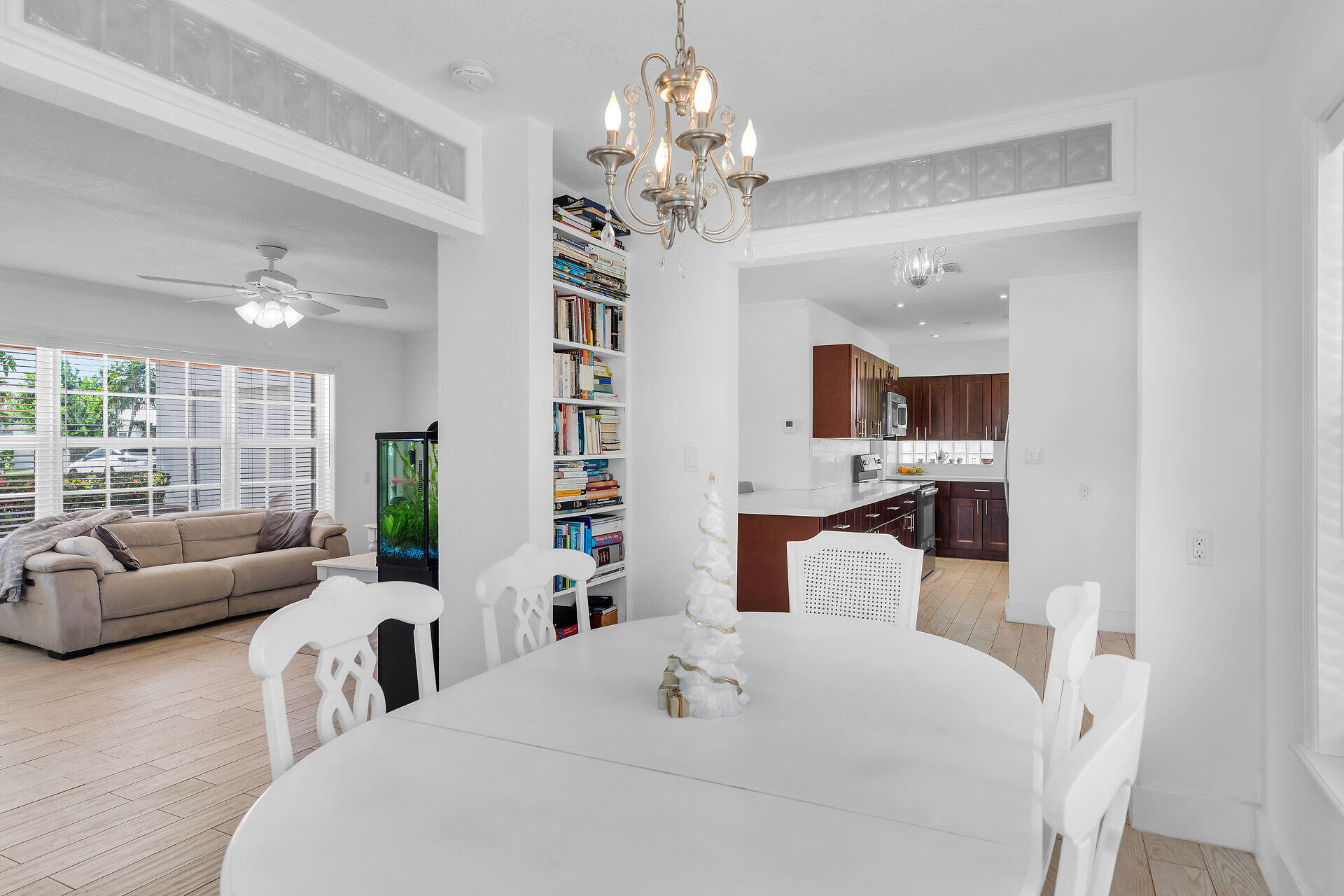 690 79th Street Marathon, FL 33050 - Photo 16 of 45 a bedroom with a large bed and a chandelier