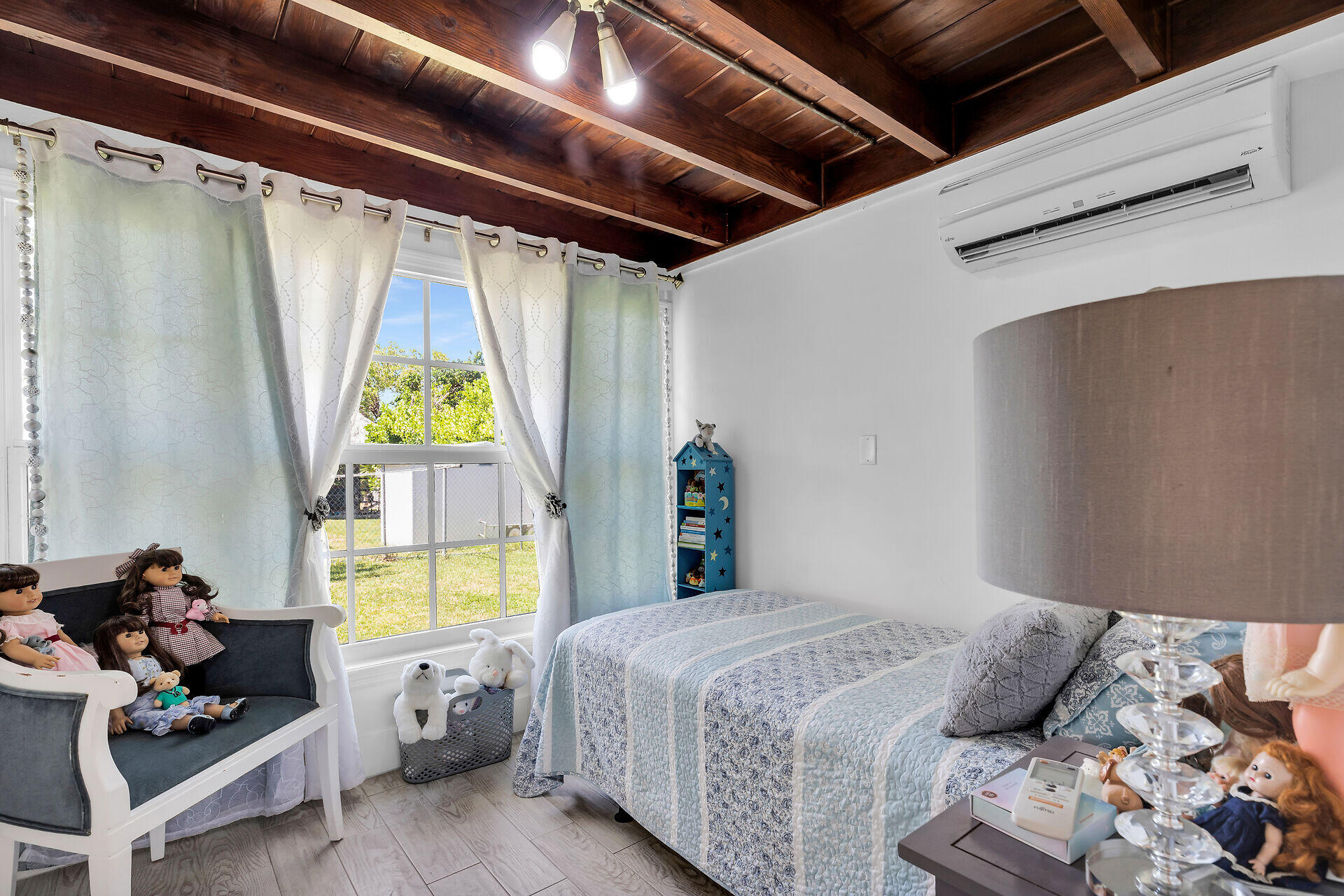 690 79th Street Marathon, FL 33050 - Photo 22 of 45 a bedroom with bed and a window