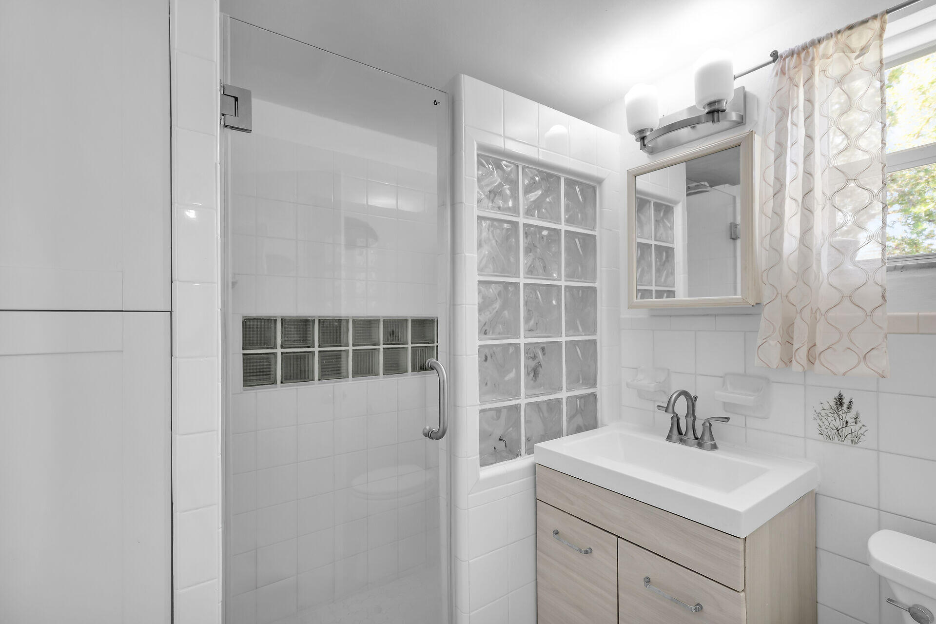 690 79th Street Marathon, FL 33050 - Photo 24 of 45 a bathroom with a sink toilet and shower